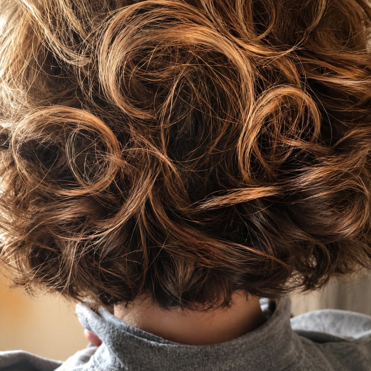 Voluminous curled hair